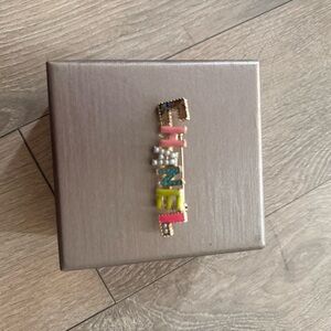 CHANEL vintage Vibrant Logo Brooch with Pearl Accents